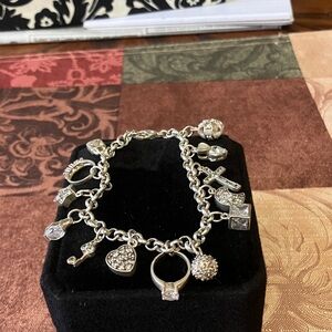 Elegant sterling silver Charm Bracelet with Intricate Charms